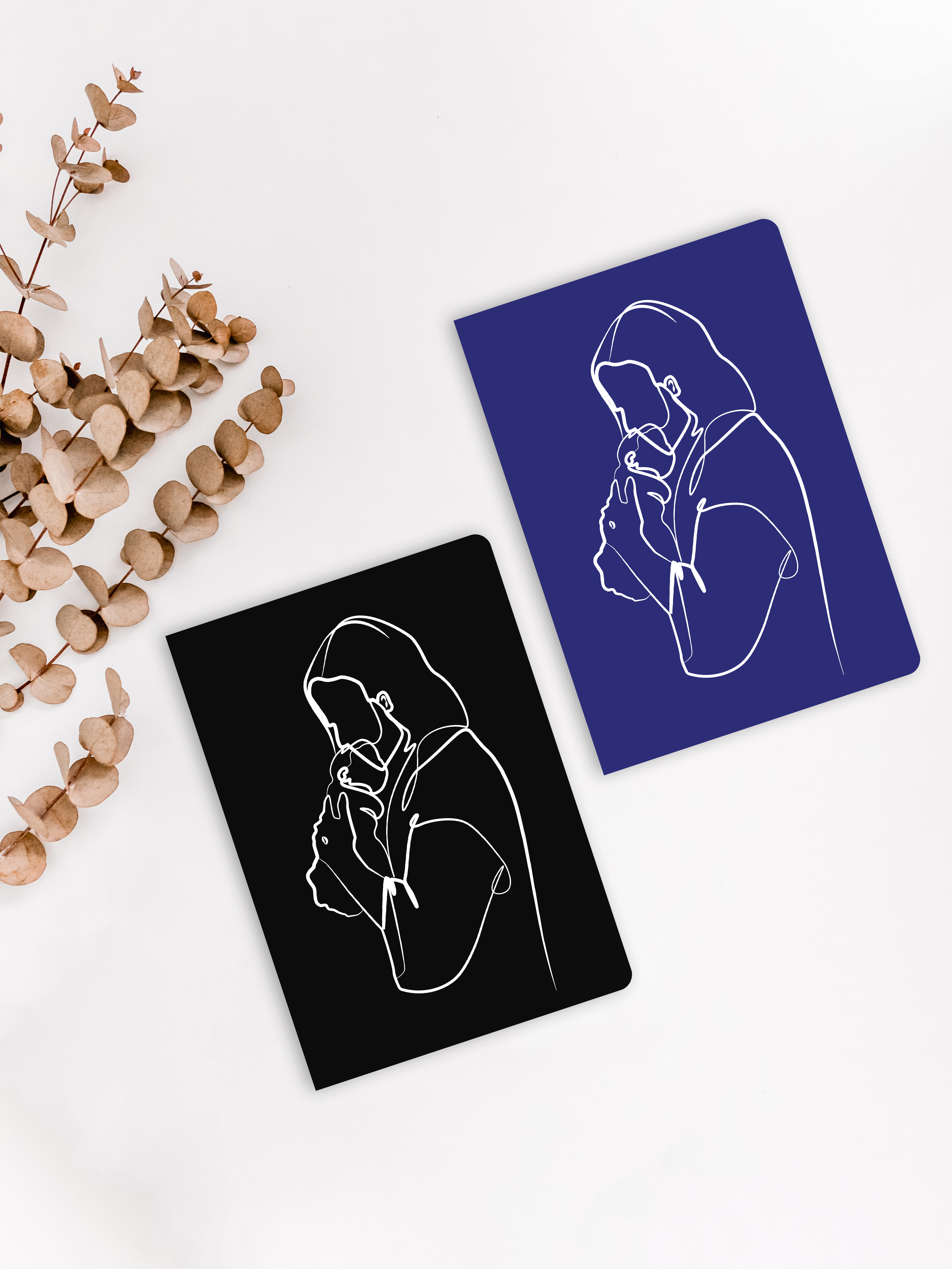 Christian Line Art design of Jesus holding a baby in His nail pierced hands, Child of God Design, A5 Christian Journals in Royal Blue and Matte Black by 4319.CO